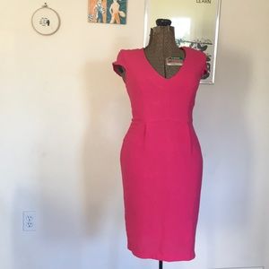 Fully lined pink wiggle dress.